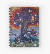 Young witch reading magic book Spiral Notebook