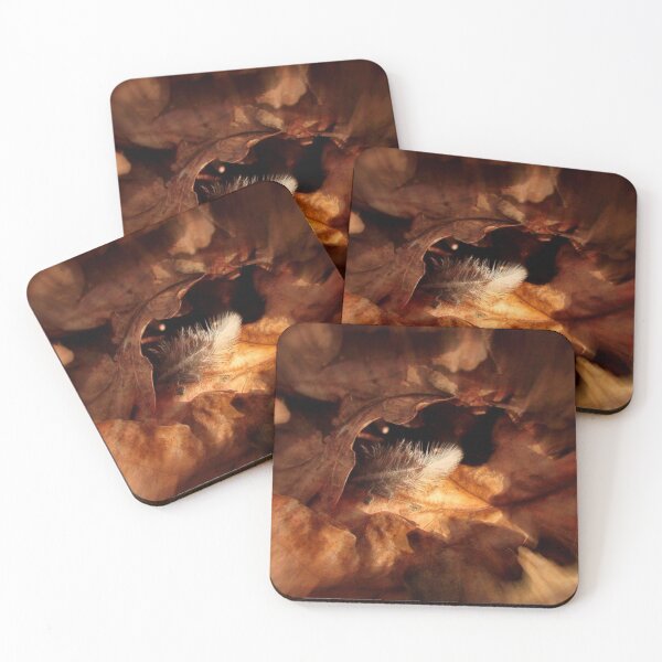 Item preview, white feather among brown leaves designed and sold by Francespoppy.