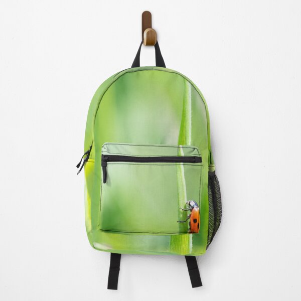 Item preview, Ladybird beetle on green grass designed and sold by sgrphotography.