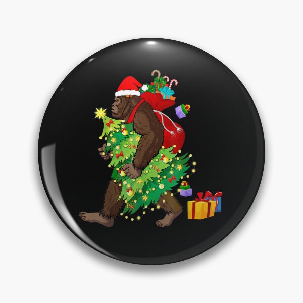 Item preview, Bigfoot Squatching Through the Snow Christmas Tree Sasquatch T-Shirt designed and sold by Blue-Rechard.