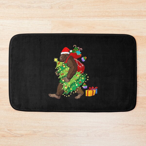 Item preview, Bigfoot Squatching Through the Snow Christmas Tree Sasquatch T-Shirt designed and sold by Blue-Rechard.