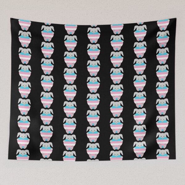 Item preview, Cute bunny rabbit holding trans flag heart designed and sold by JPN4Design.