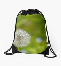 Dandelion in green background Drawstring Bag
