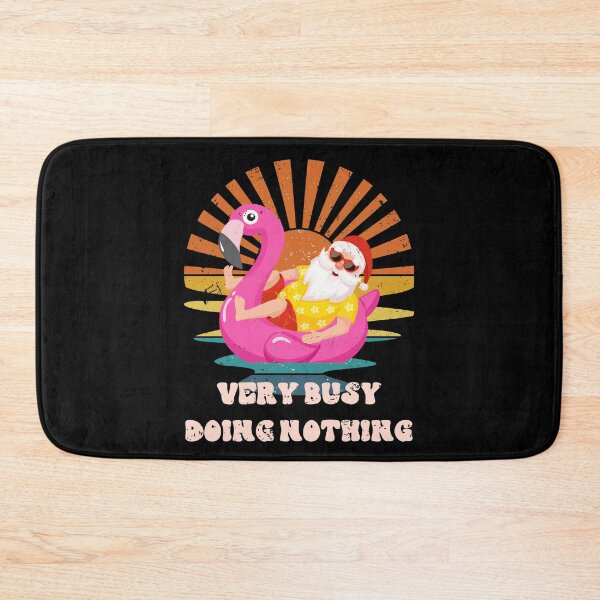 Item preview, Very Busy Doing Nothing Funny Christmas Design Santa Relaxing Floatie designed and sold by RockBeeDesigns.
