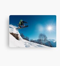 Snowboarder Jumping on a snowy mountain Canvas Print