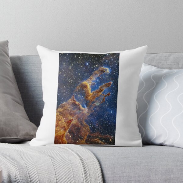 The Pillars of Creation are set off in a kaleidoscope of color in NASA’s James Webb Space Telescope’s near-infrared-light view Throw Pillow