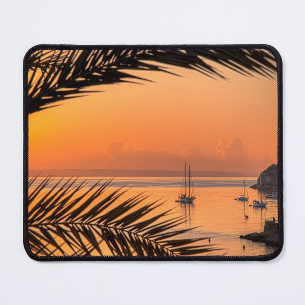 Item preview, Golden hour print. Before Sunrise over Palma Nova bay. Palm trees and sail boats in this Mediterranean bay designed and sold by Drew McAvoy.