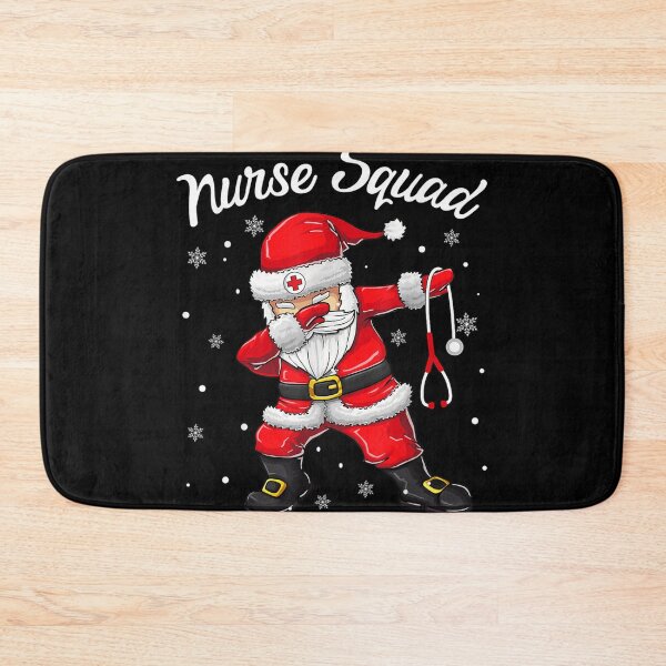 Item preview, Christmas scrub tops women dabbing santa scrubs nurse squad designed and sold by GomeThomas.
