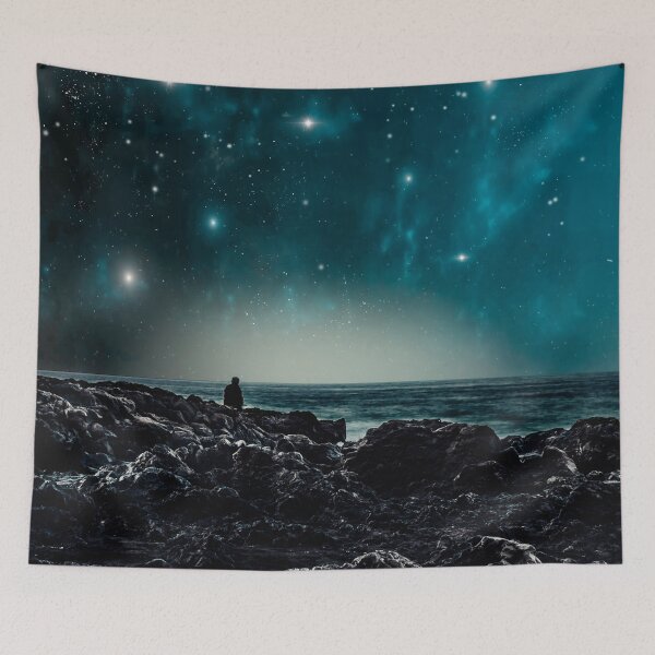 Item preview, Musing - Man on rocky beach looking at sea and stars designed and sold by Dyrk Wyst Redbubble Shop.