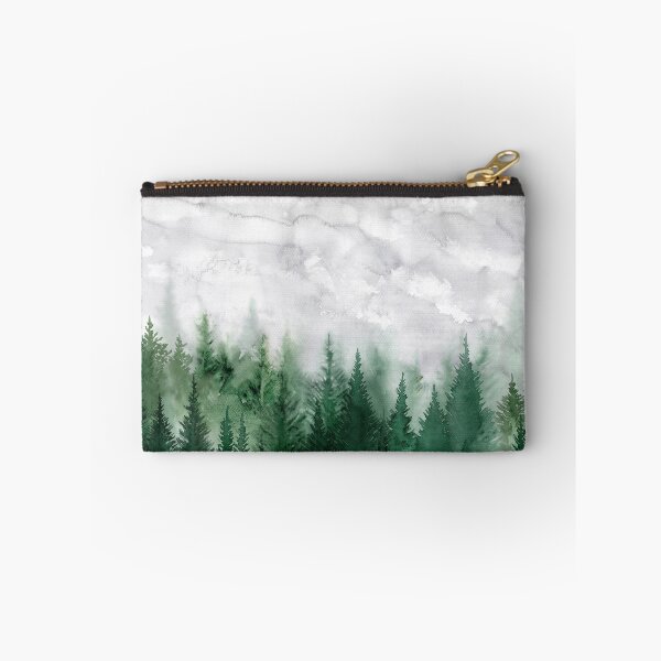 Artikelvorschau, Regentag, ein Waldrand mit Tannen unter Wolken verhangenem Himmel Aquarell entworfen und verkauft von Rebecca Reck Art.