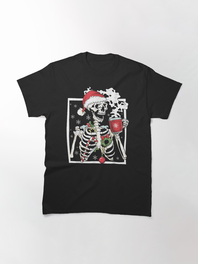 Disover Christmas Skeleton With Smiling Skull Drinking Coffee Latte T-Shirt
