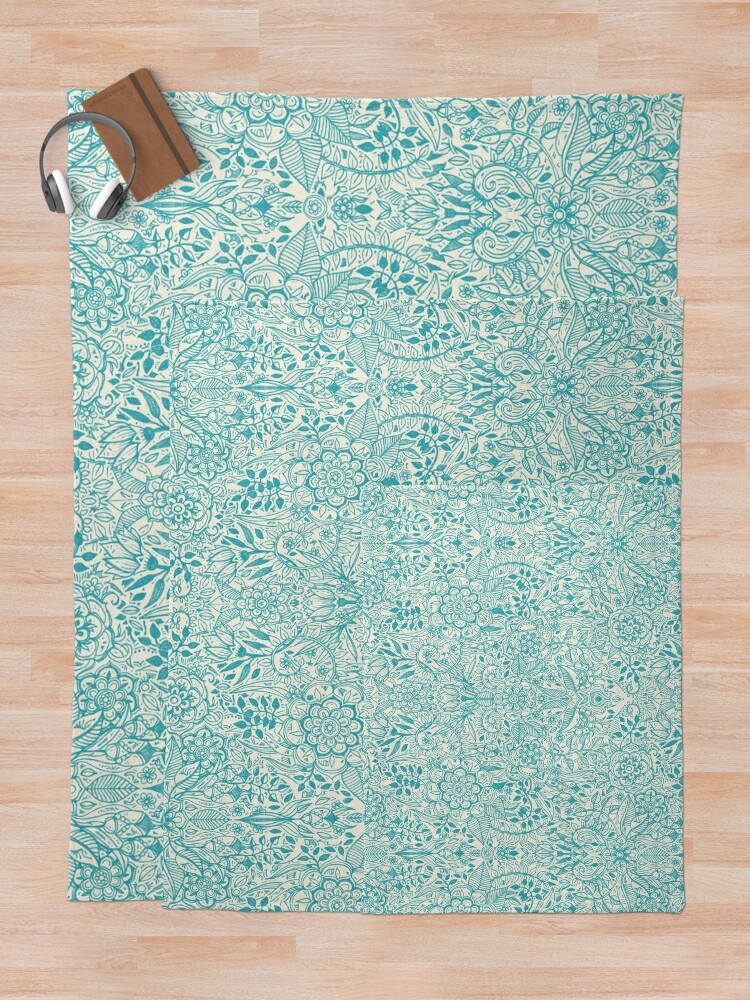 Detailed Floral Pattern in Teal and Cream