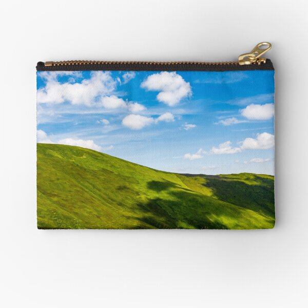 green alps under blue sky Zipper Pouch