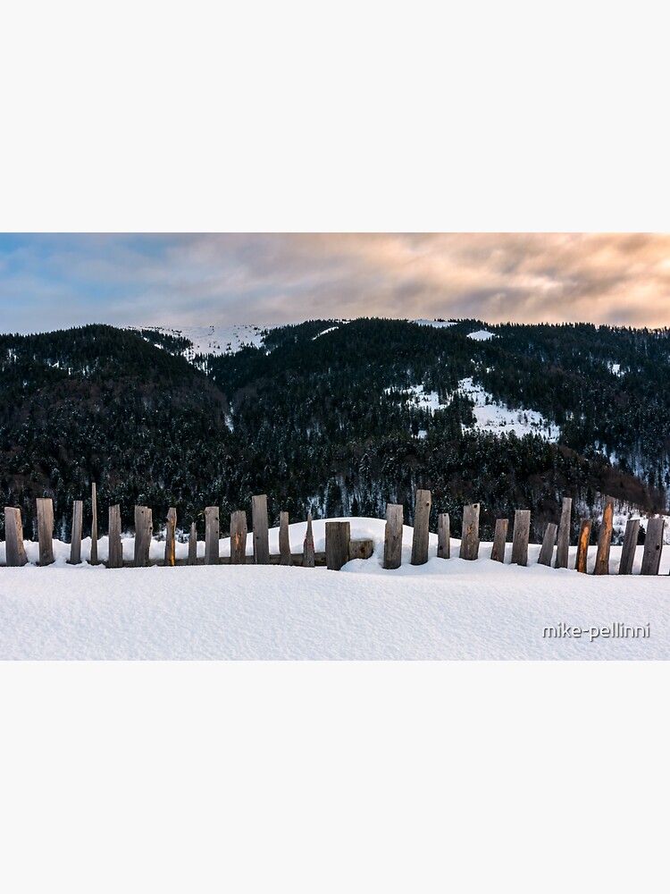 Thumbnail 3 of 3, Sticker, old wooden fence in snow on hillside designed and sold by mike-pellinni.