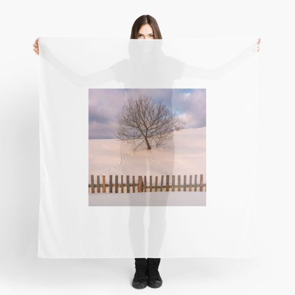 lonely tree on snowy hillside behind the fence Scarf