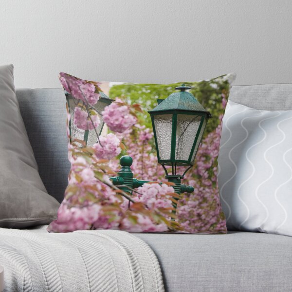 green lantern among cherry blossom Throw Pillow