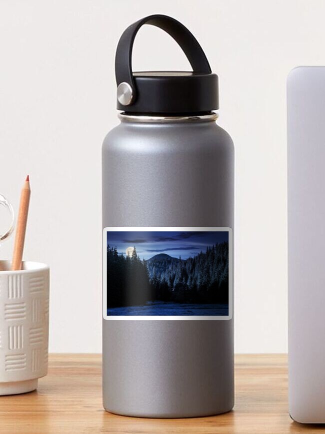 Thumbnail 1 of 3, Sticker, spruce forest in mountains at night designed and sold by mike-pellinni.