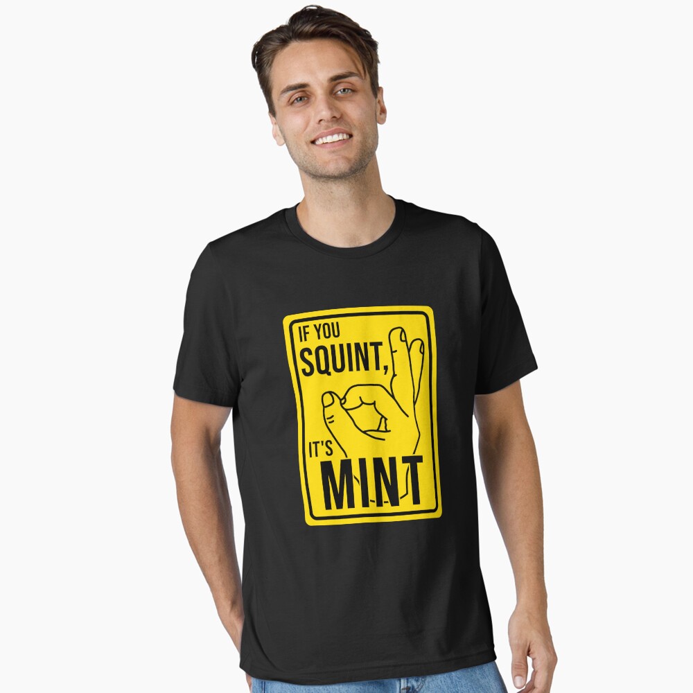 Vista previa del artículo con la obra «Camiseta esencial», diseñado y vendido por DisenyosDeMike.