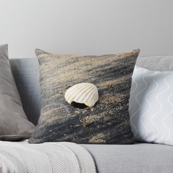 Item preview, White seashell on a black sandy beach designed and sold by mark-taylor.