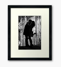 The embrace Framed Print