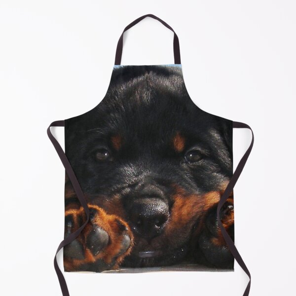 Item preview, Cute Rottweiler Puppy Resting Head Between Paws designed and sold by taiche.
