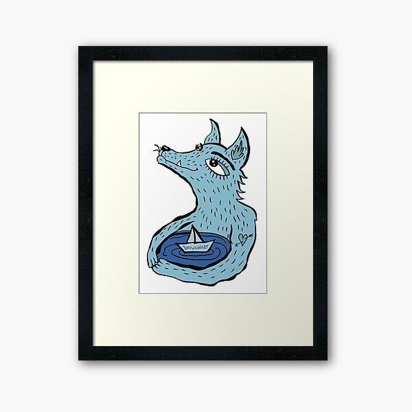 Blue wolf and sea Framed Art Print