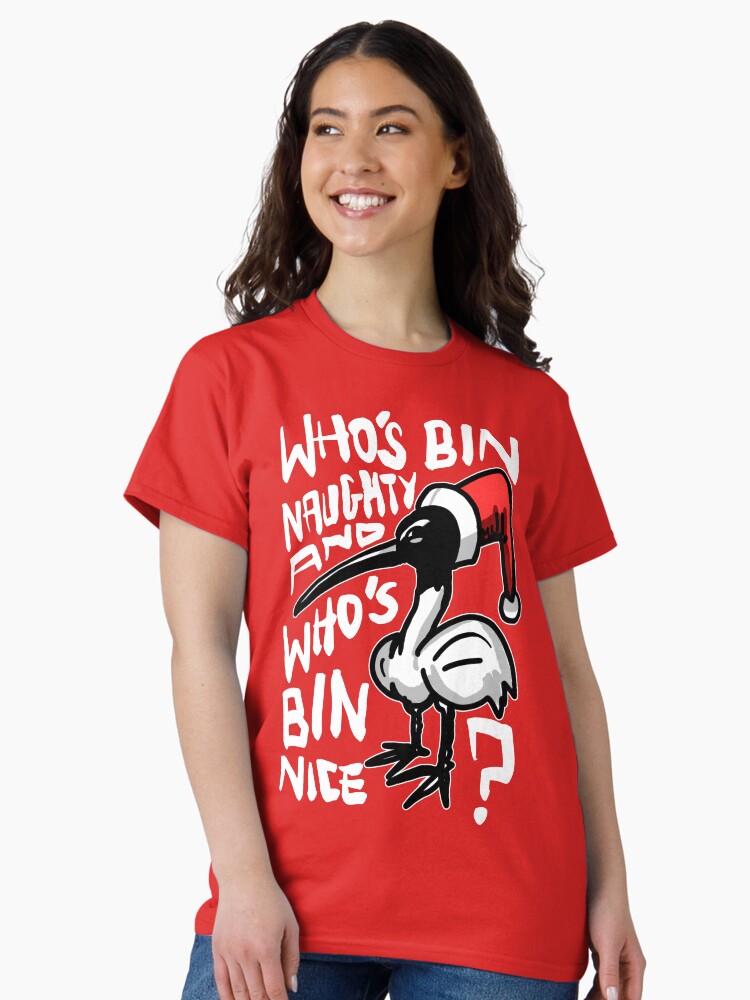 Thumbnail 1 of 7, Classic T-Shirt, Christmas Bin Chicken T Shirt - Australian Bin Chicken Christmas Themed Tee with quote "Who's Bin Naughty" featuring an Aussie Ibis bird! designed and sold by sketchNkustom.