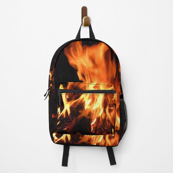 Item preview, Blazing bonfire with orange and yellow flames on a dark night. designed and sold by claireseyeview.