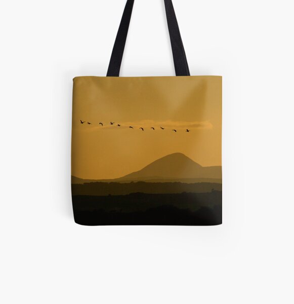 Geese over Derryveagh mountains at Twilight All Over Print Tote Bag