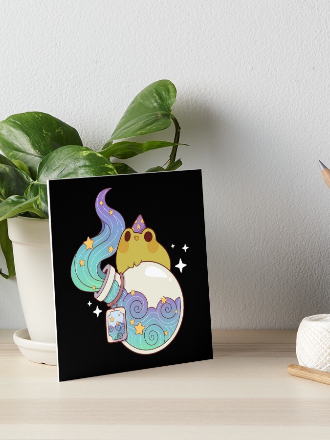 Thumbnail 1 of 2, Art Board Print, Dreamy water potion with wizard frog designed and sold by Rihnlin.