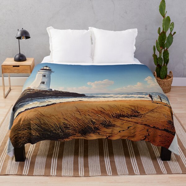 Item preview, White Lighthouse on a Sunny Beach designed and sold by Wander Lost.