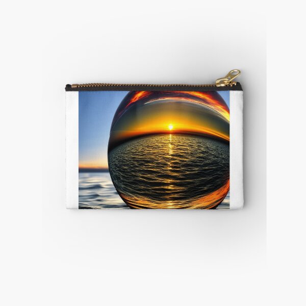 Item preview, Abstract art of a crystal sphere hovering above the ocean and reflecting the setting sun. Digital art designed and sold by Bookwyrm-Bazaar.