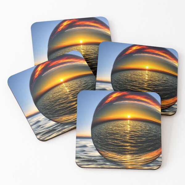 Item preview, Abstract art of a crystal sphere hovering above the ocean and reflecting the setting sun. Digital art designed and sold by Bookwyrm-Bazaar.