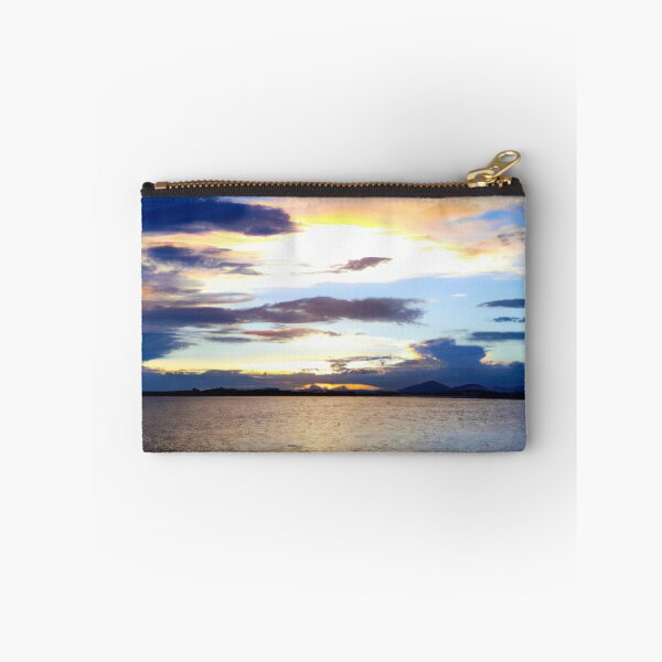 Item preview, Sunset of a beach. Blue waves in the water. designed and sold by Chris Purdy.