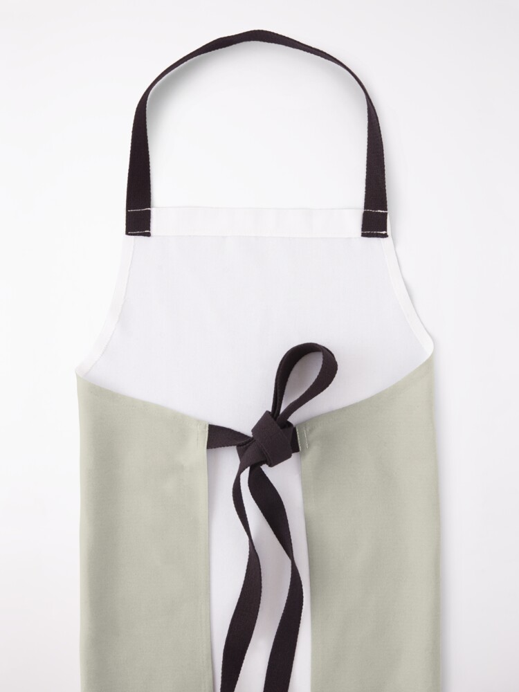 Disover Calico Cat Hanging On Apron