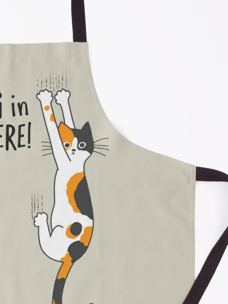 Discover Calico Cat Hanging On Apron