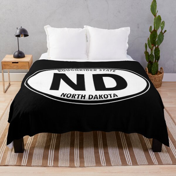 Item preview, North Dakota, ND, Bismarck, Roughrider State - State Abbreviation and Motto Oval Travel Bumper Sticker for your Car or Luggage.  designed and sold by BBTravels.