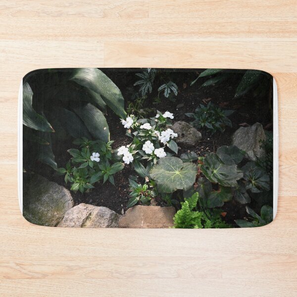 Item preview, Tiny white flowers among green leaves and rocks designed and sold by dabingboshi.