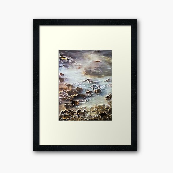 Universe in a frozen puddle Framed Art Print