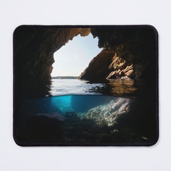 Item preview, Inside a sea cave on the shore split view over under water designed and sold by Seaphotoart.