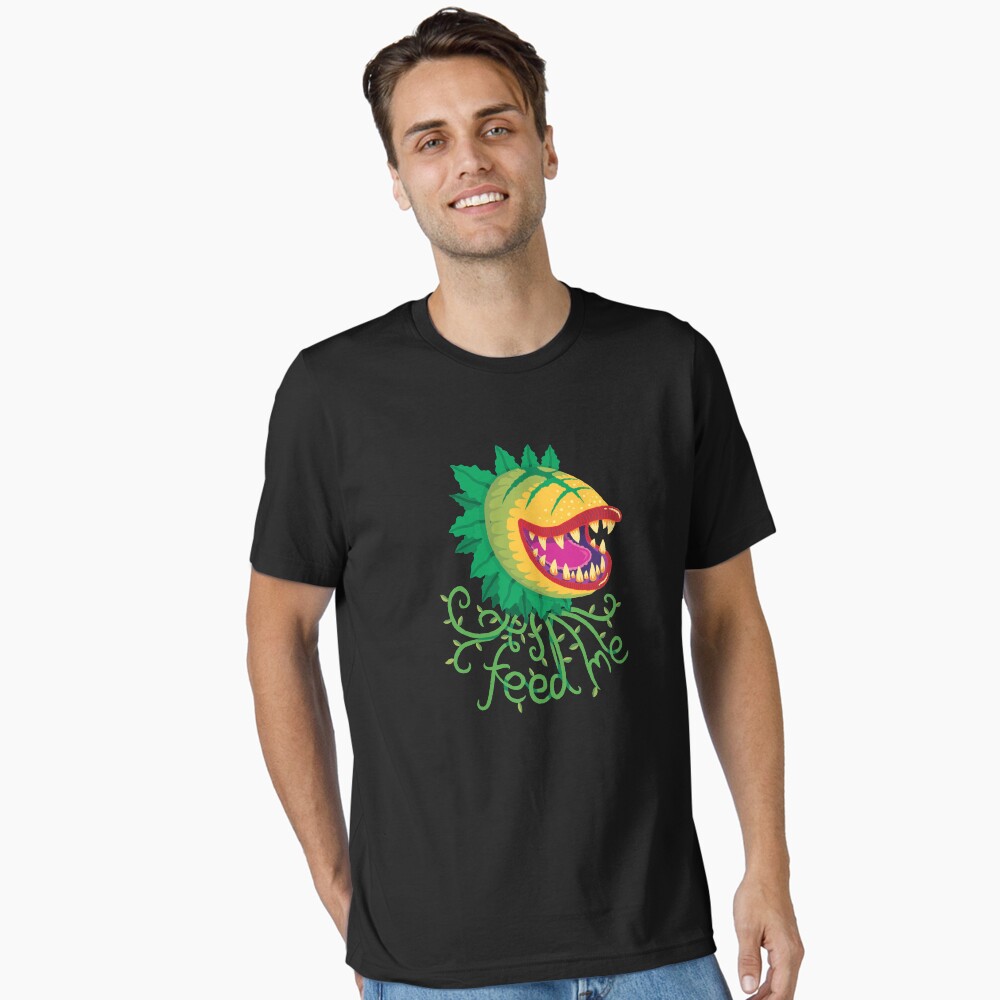 Vista previa del artículo con la obra «Camiseta esencial», diseñado y vendido por DinoMike.
