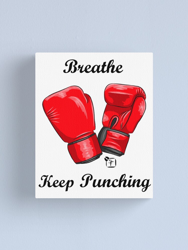 punching wall with boxing gloves