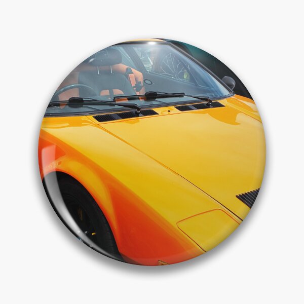 Artikelvorschau, Klassischer De Tomaso Pantera in Orange entworfen und verkauft von Graham Cornall.