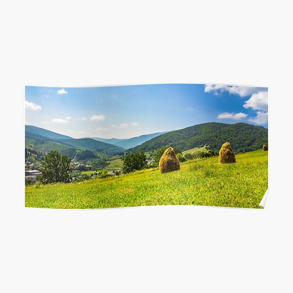 haystacks on hillside near the village Poster