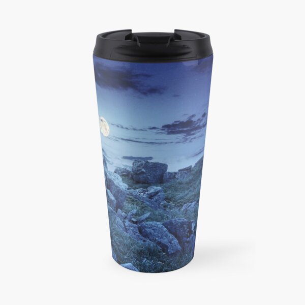 boulders on the mountain meadow with dandelions at night Travel Mug