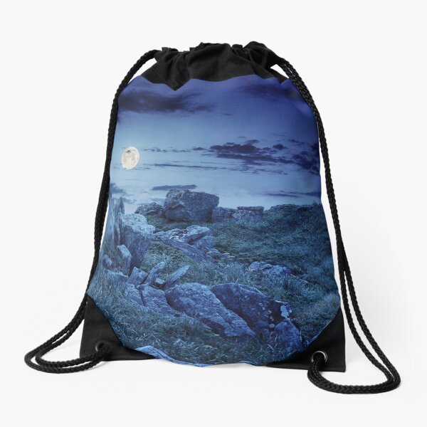 boulders on the mountain meadow with dandelions at night Drawstring Bag