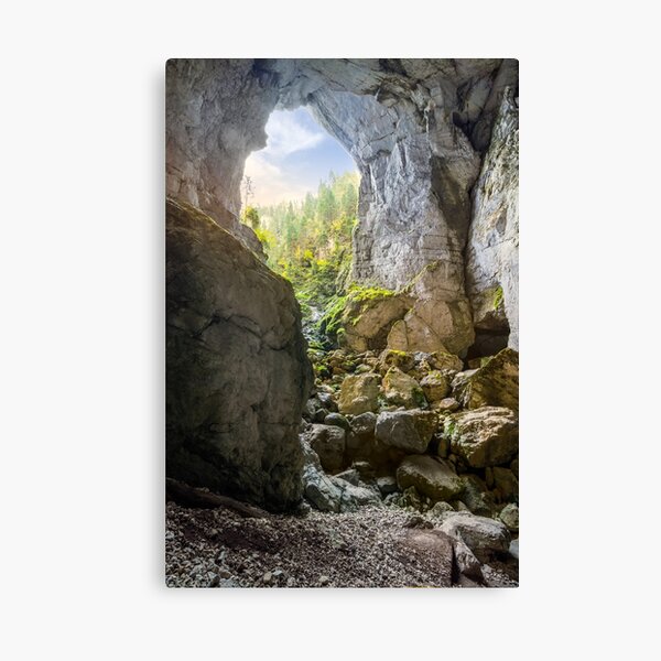 Cetatile cave sculpted by river in romanian mountains at sunrise Canvas Print