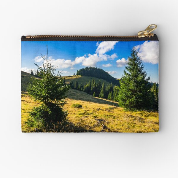 conifer forest in mountains at sunrise Zipper Pouch