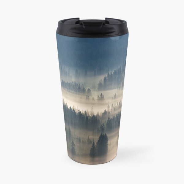 coniferous forest in foggy mountains Travel Mug
