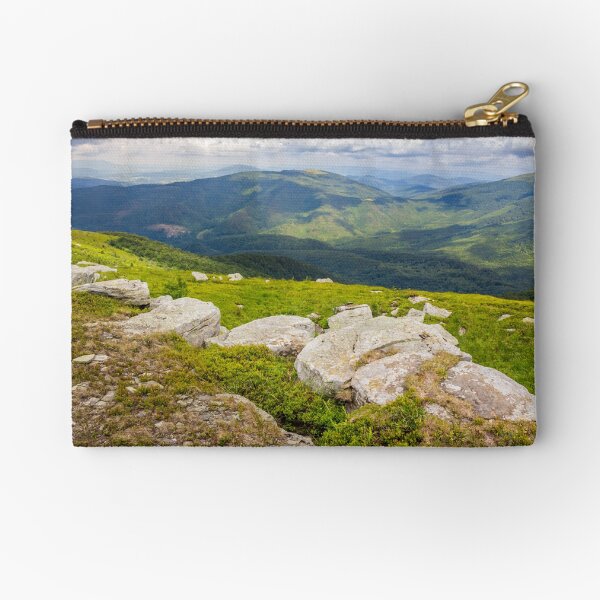 white boulders on the hillside Zipper Pouch